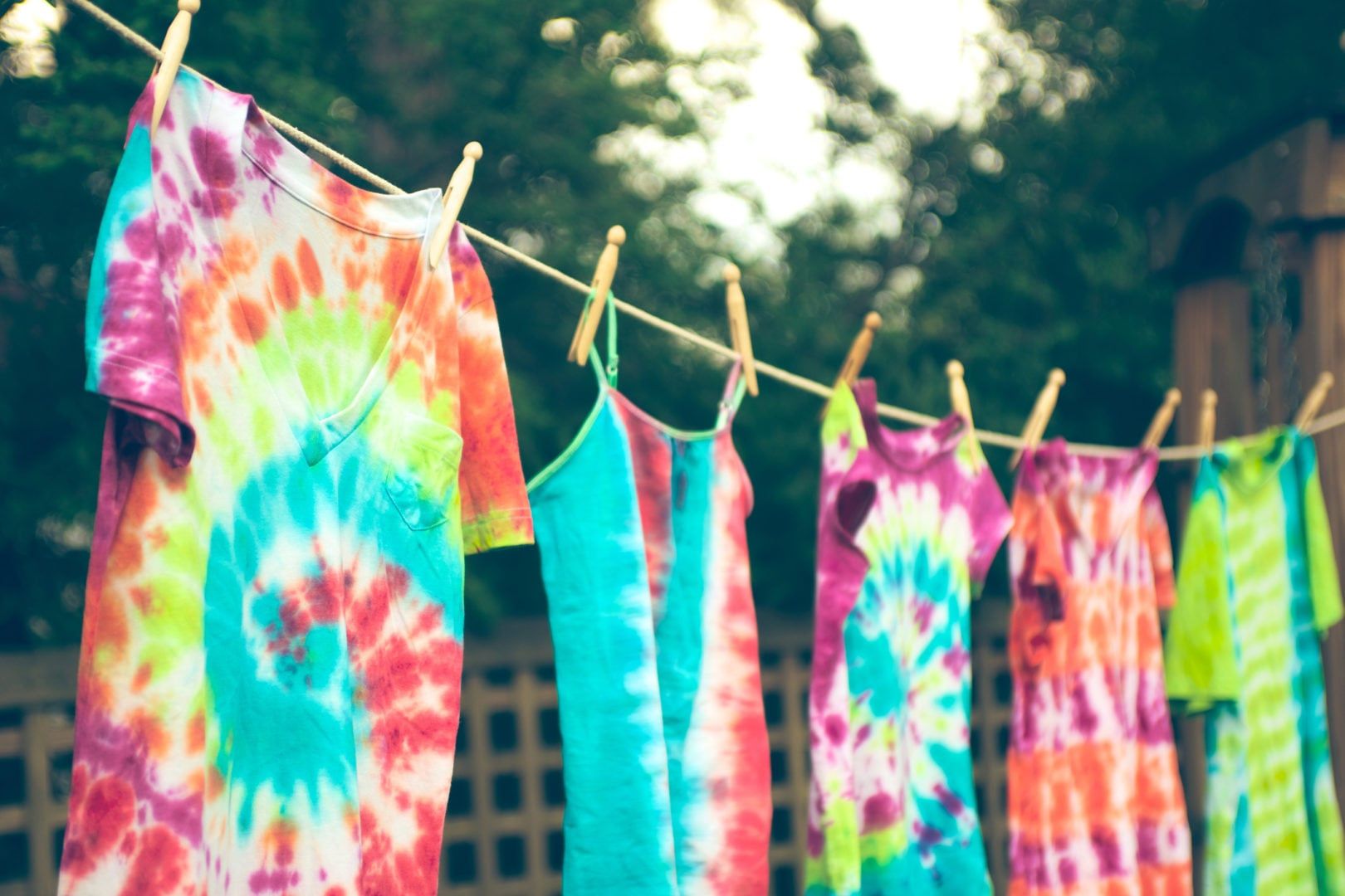 Watch and learn how to tie-dye swirling colours onto your bags and clothes  at home