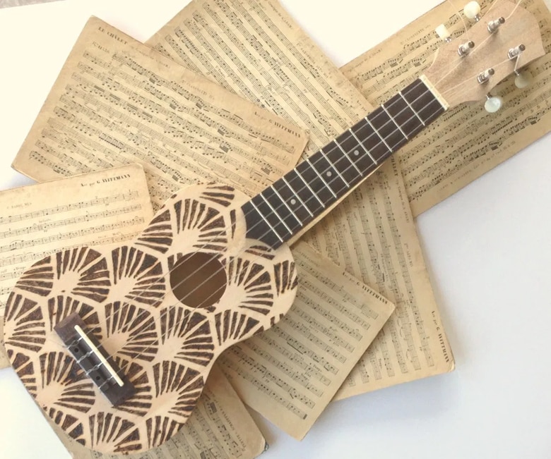This DIY decorated ukulele is a Father’s Day gift that kids can make