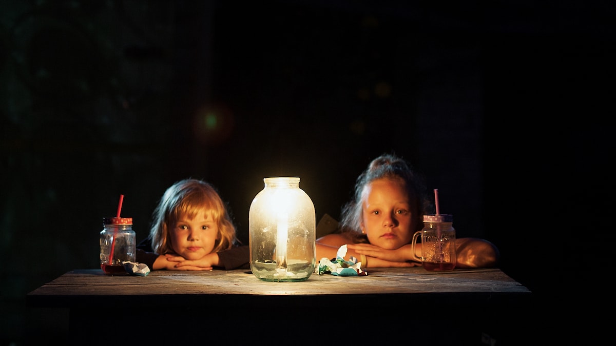 Mom says living by candlelight is the trick to getting kids to go to sleep