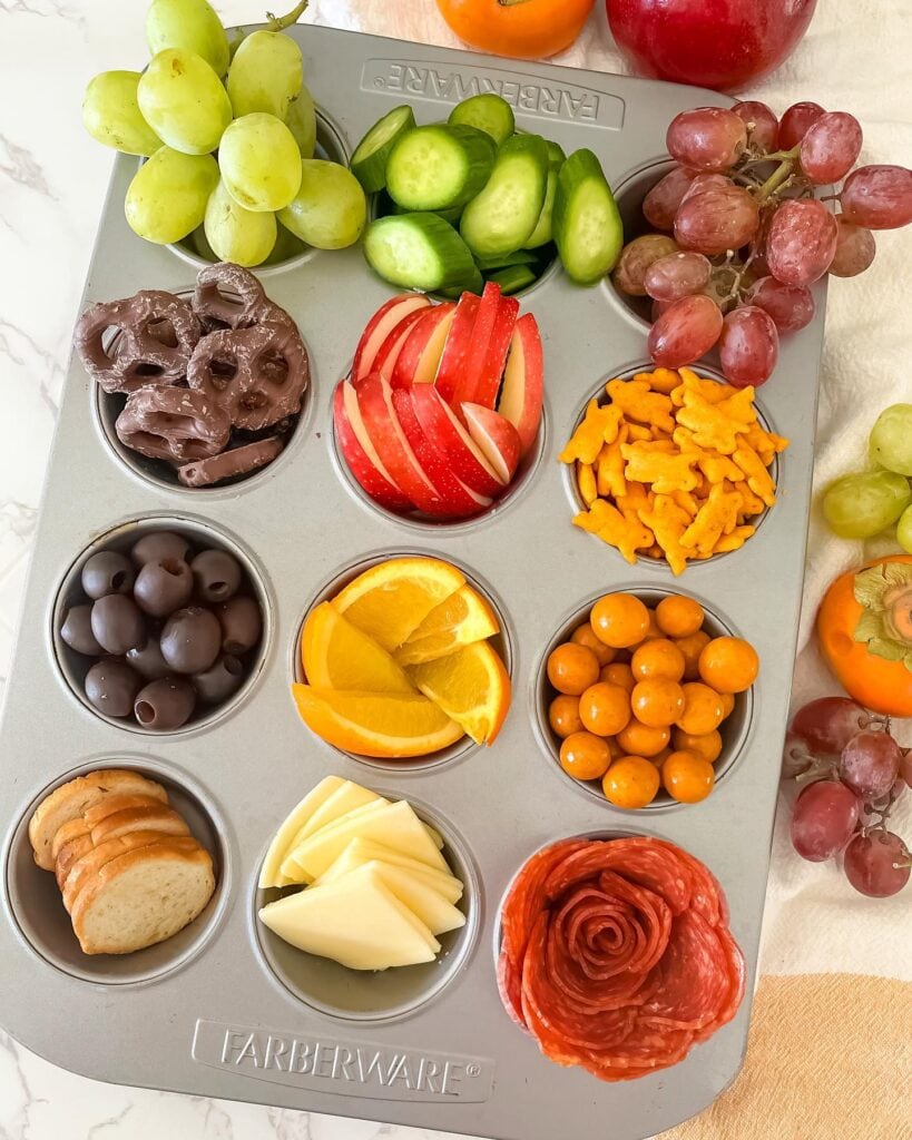 This DIY snack tray using a muffin tin is a great idea for summer kids' snacks