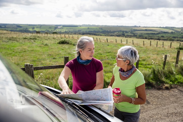 older adult on road trip