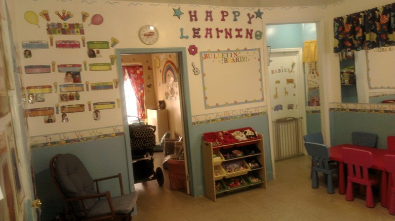 Happy Learning Daycare Logo