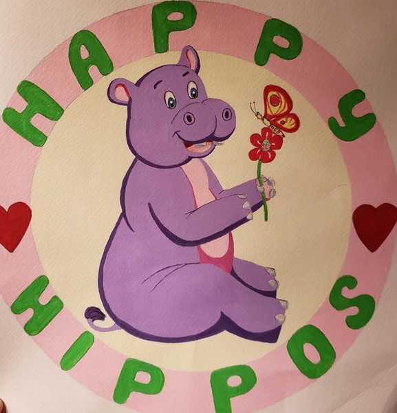 Happy Hippos Daycare Logo