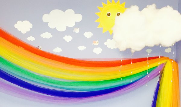 Sunshine Over The Rainbow Logo